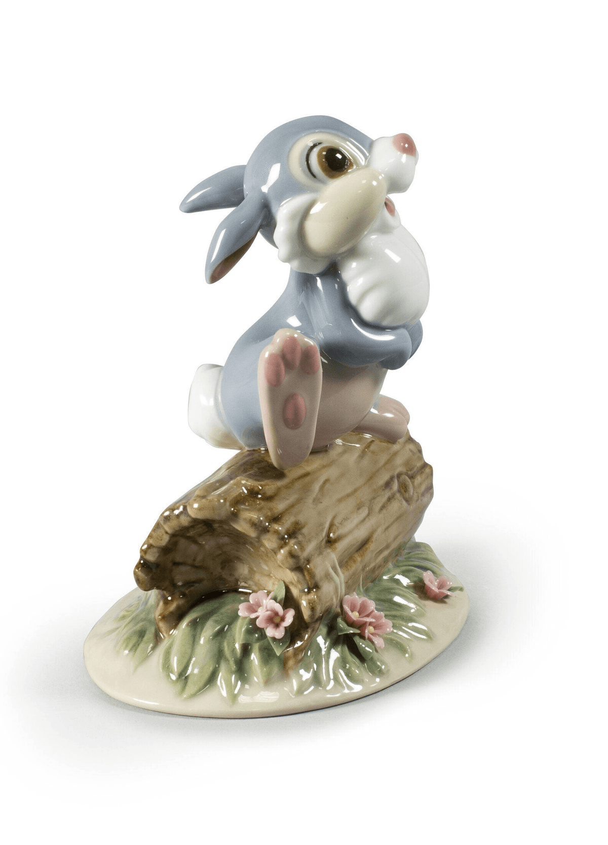 Lladró - Thumper Figurine in glazed porcelain, showcasing Thumper with a smile on a log, ideal for collectors.