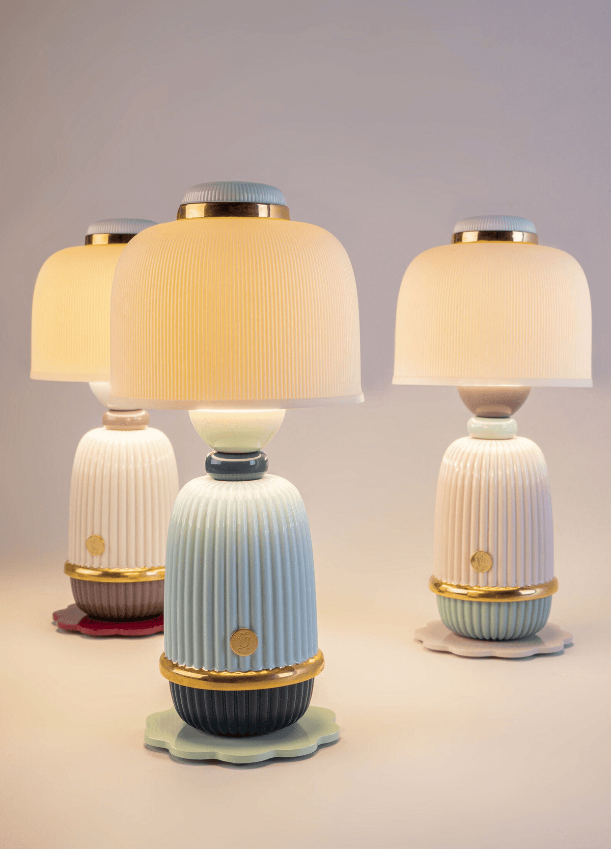 Lladró - Kokeshi lamp - Blue made of glazed Lladro porcelain. Decorative cordless lighting with pastel tones and elegant gold accents.