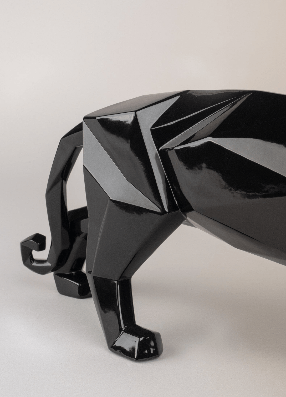 Lladró - Panther Sculpture - Glazed Black, a geometric black porcelain figure showcasing elegance and style.