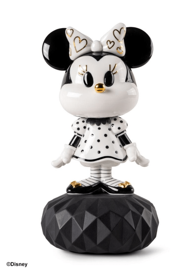 Lladró - Minnie in Black and White Sculpture, a porcelain decoration with gold accents.