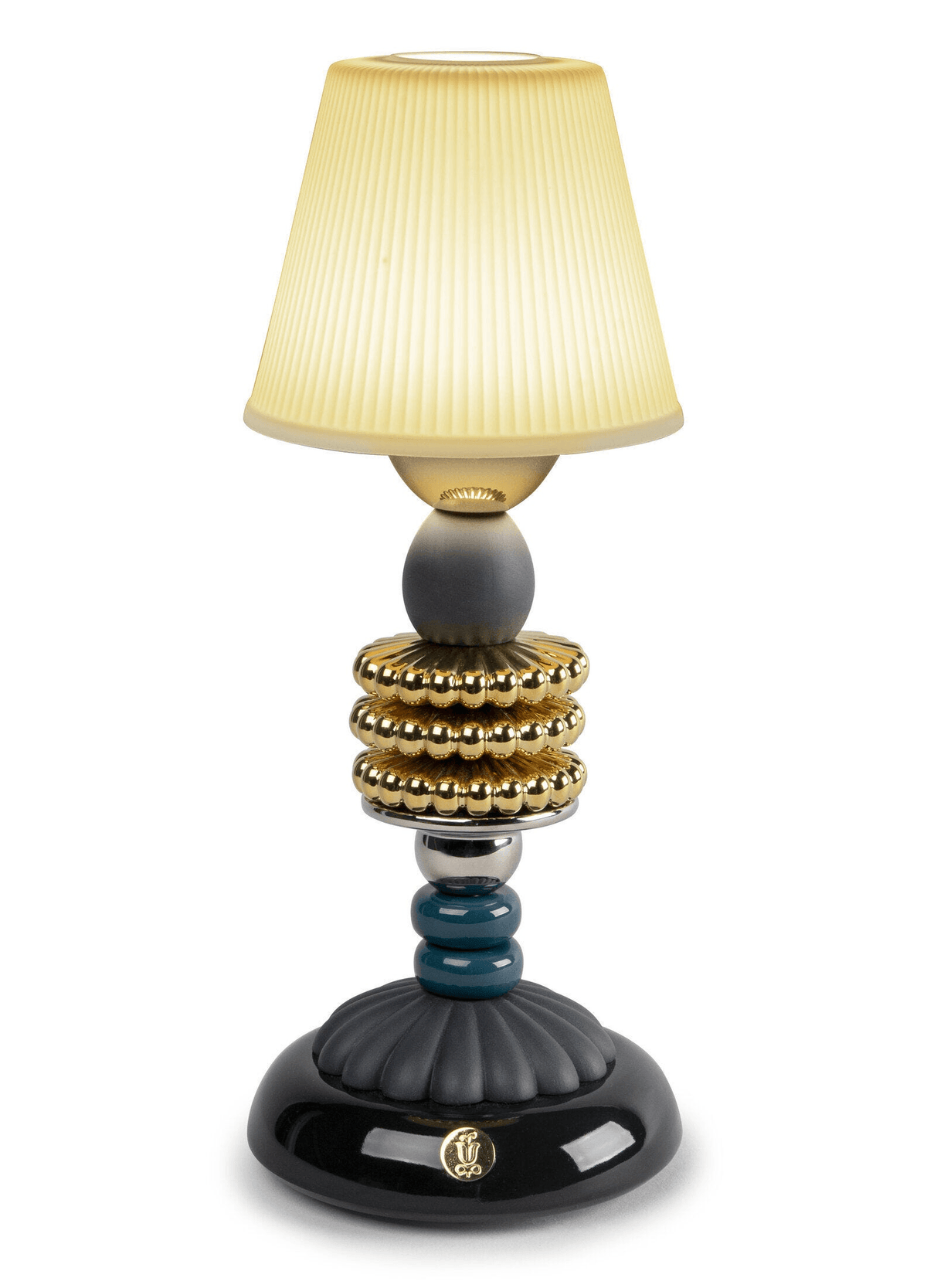 Lladró - Firefly cordless lamp by Olga Hanono in Lladro Porcelain with metallic and black base.