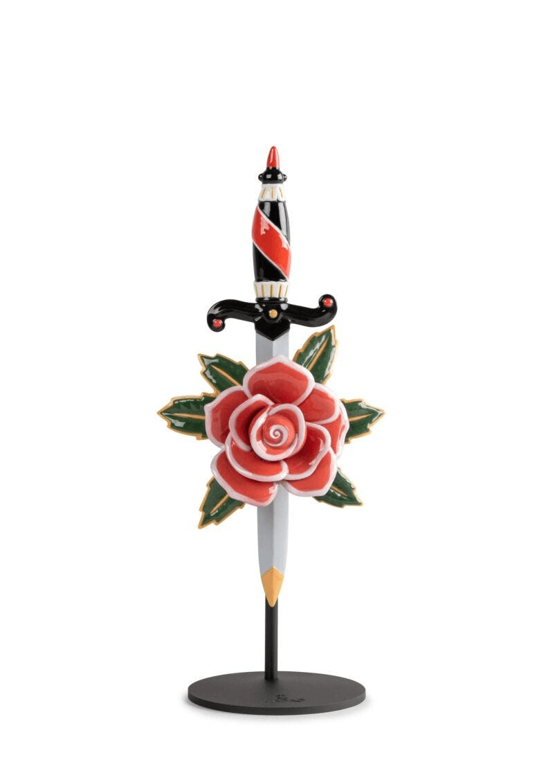 Lladró - Dagger and Rose Figurine, glazed porcelain rose and dagger design with vibrant colors.