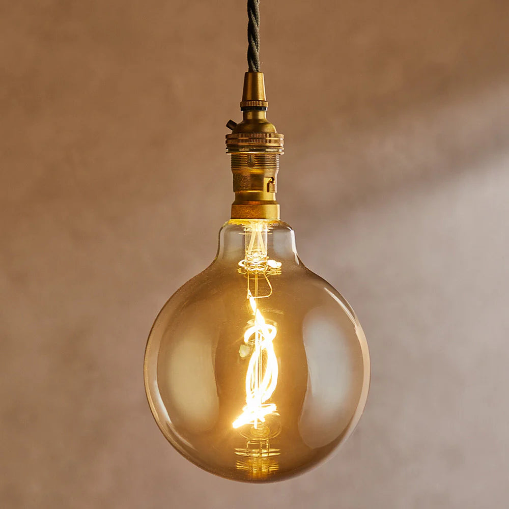 Pooky Extra Large Globe 4 Watt Irregular Filament LED Bulb with Amber Coating and B22 Fitting