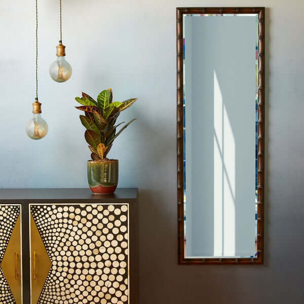 Pooky - Baloo Full Length Mirror - Mahogany displayed in a stylish interior setting with pendant lights and a plant.