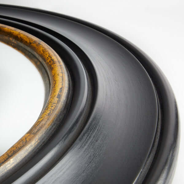 Pooky - Marlon Convex Mirror - Black and Gold close-up of the unique frame detailing, showcasing the black and gold finish.