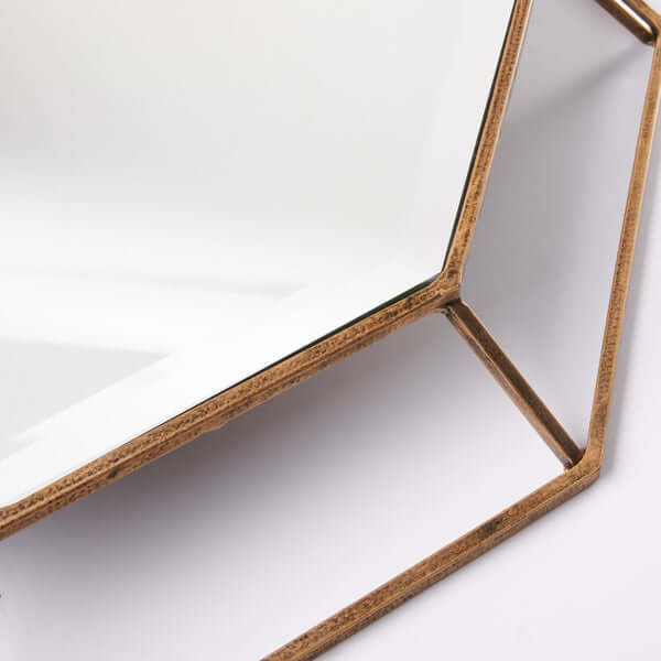 Pooky - Octagon Mirror - Clear Glass with Antique Gold Frame close-up showing detail of the metal frame and bevelled mirror.
