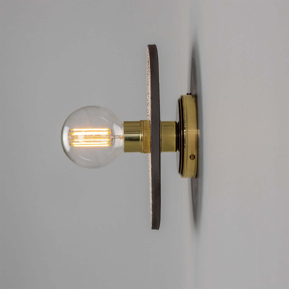 Mullan - Bog Oak Organic Ceramic Disc Wall Light Black Clay - Polished Brass Finish