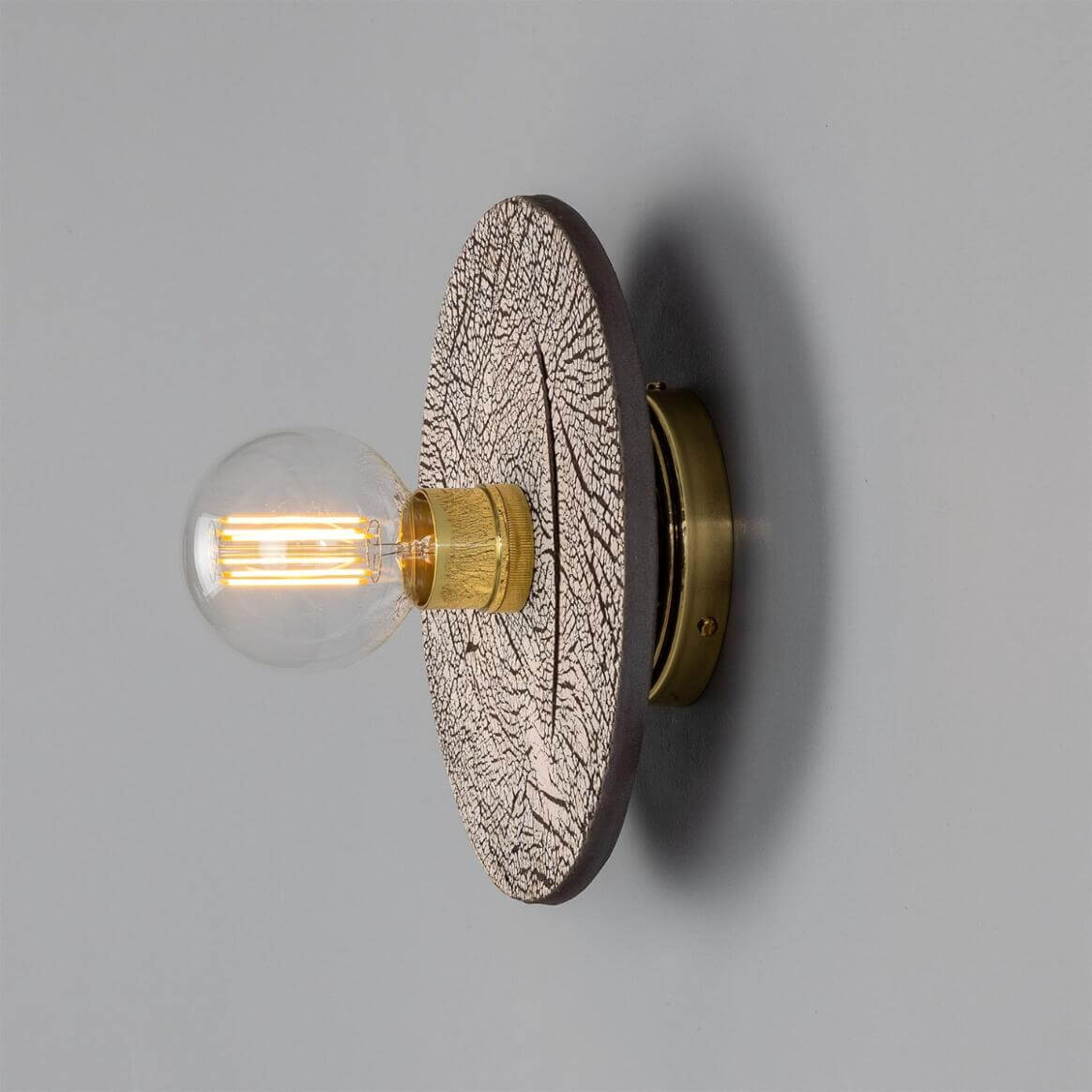 Mullan - Bog Oak Organic Ceramic Disc Wall Light Black Clay - Polished Brass Finish