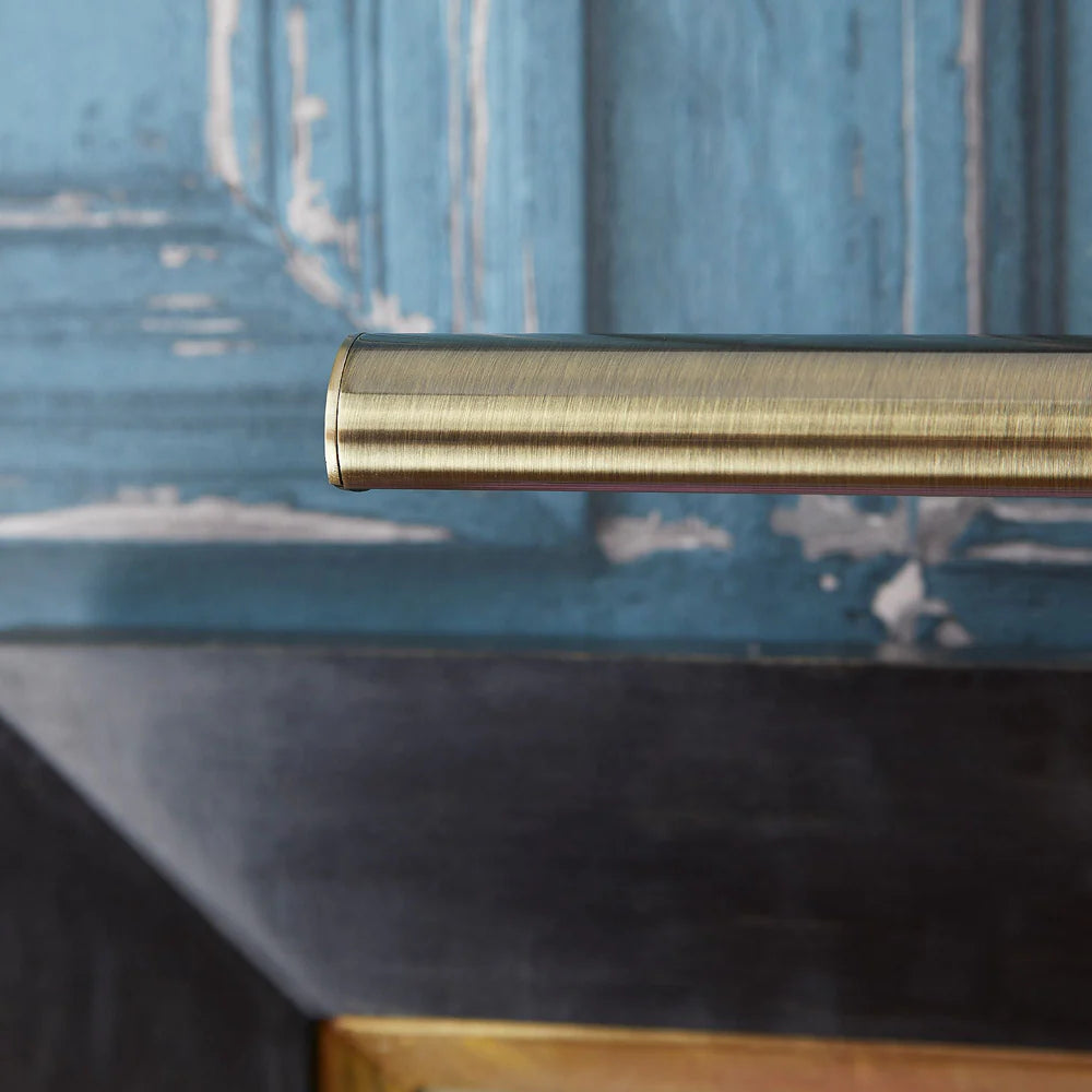 Pooky Smaller Turner Picture Wall Light in antique brass finish