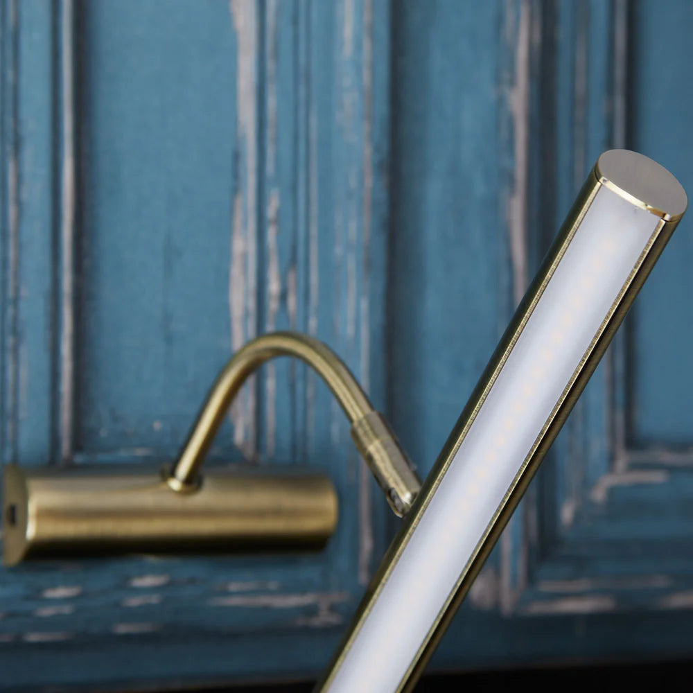 Pooky Smaller Turner Picture Wall Light in antique brass finish