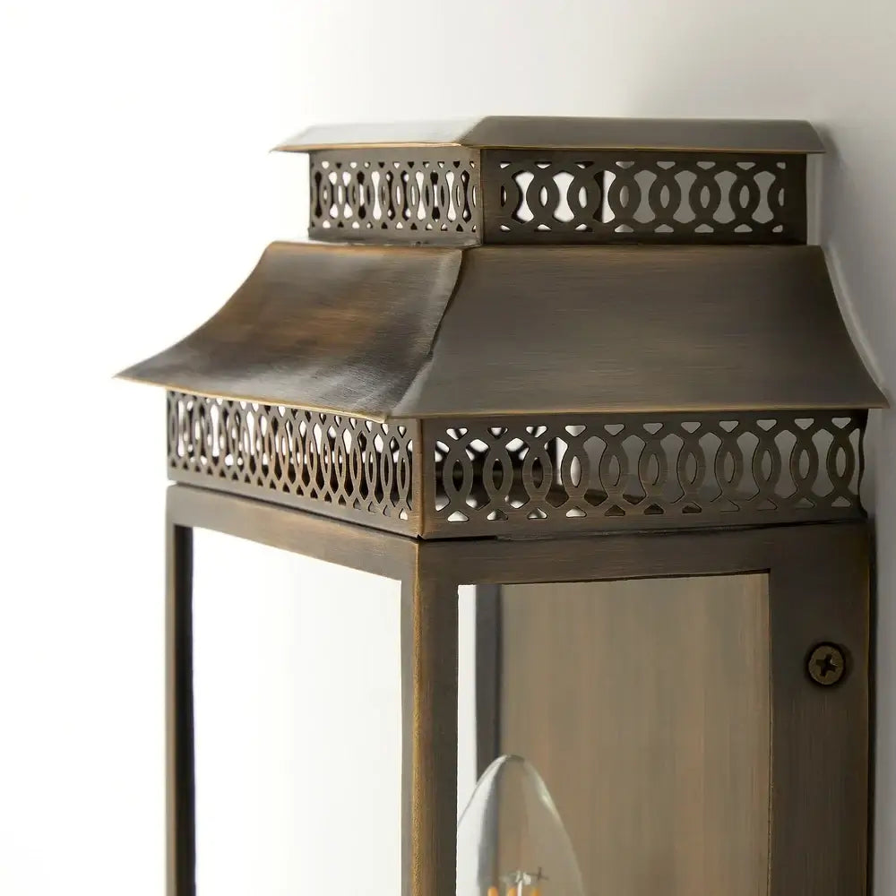 Pooky Hastings Exterior IP44 Wall Light in Bronze, showcasing elegant pagoda-style design and solid brass construction.