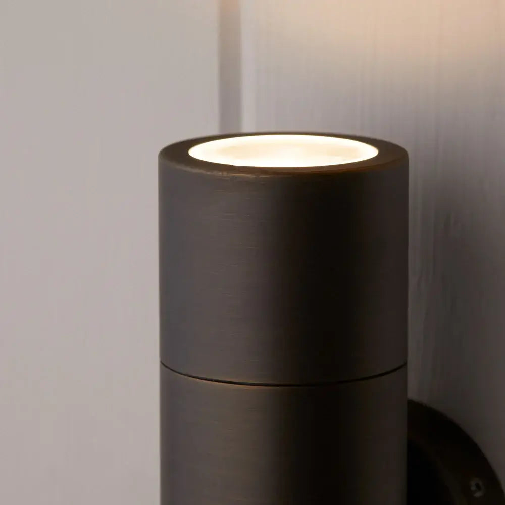Pooky Portreath IP65 Up and Down Pillar wall light in Bronze, showcasing the top light fixture detail.