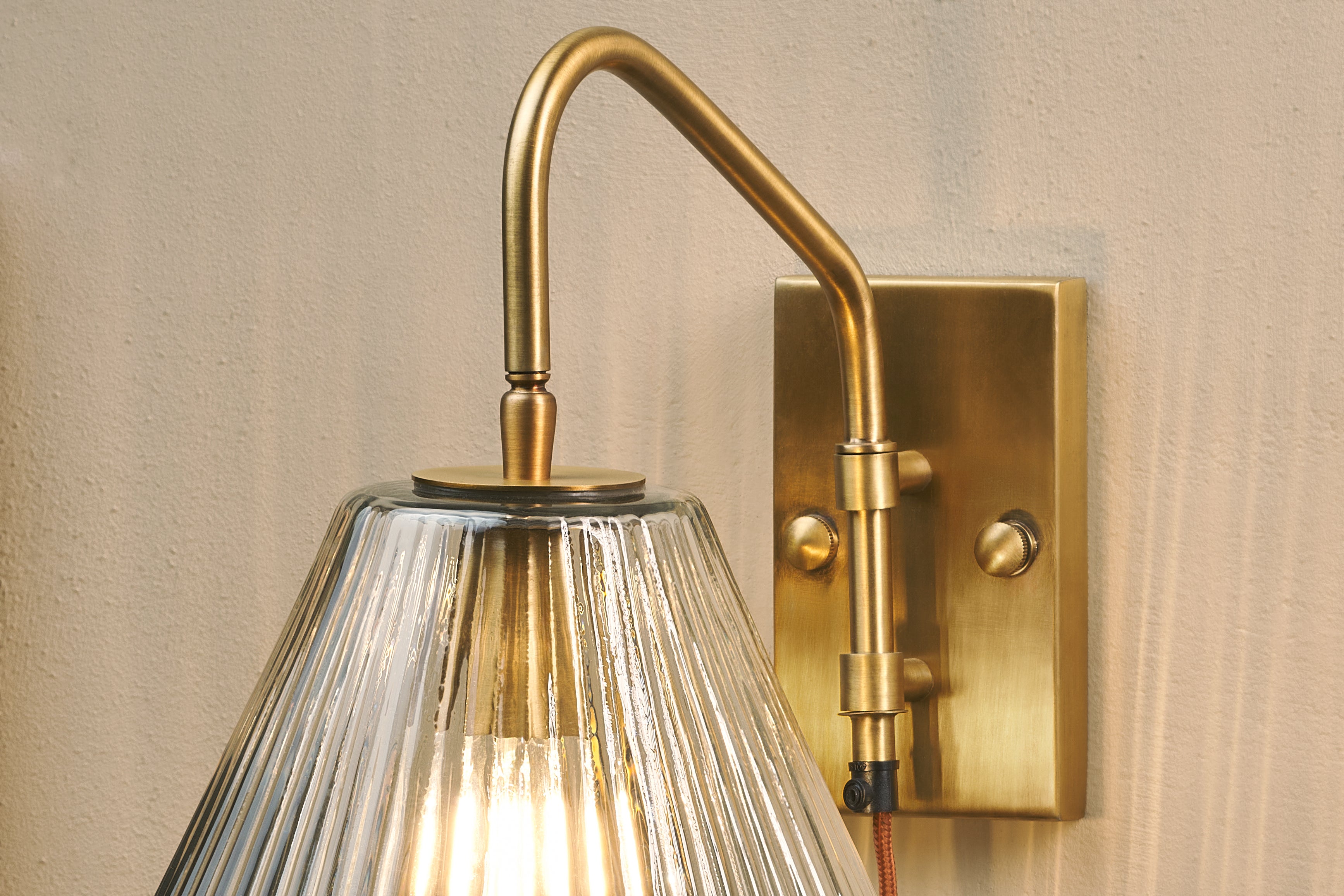 Nkuku Akoli Glass Wall Lamp - Clear & Antique Brass