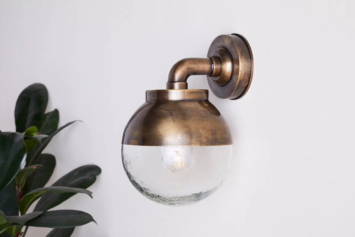 Nkuku - Abeo Outdoor Wall Lamp - Antique Brass