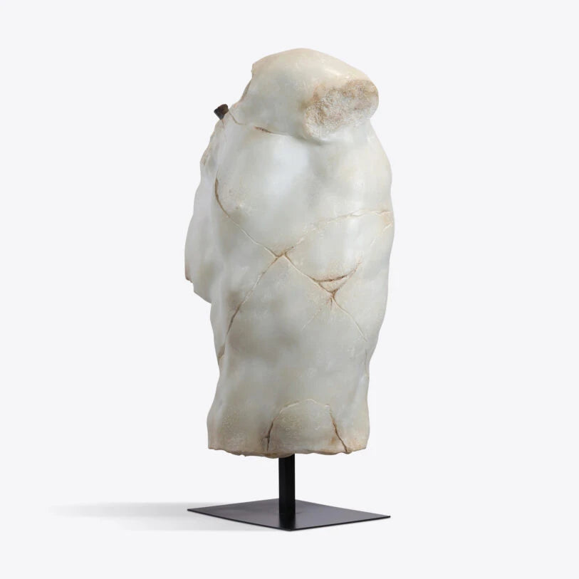 Pure White Lines Sirrus XL Male Torso sculpture in aged marble finish on a black stand.