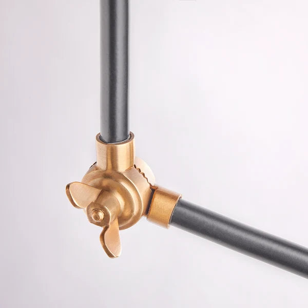 Brass wingnut adjustment joint on the Pooky - Pick Reading Lamp - Black And Antiqued Brass