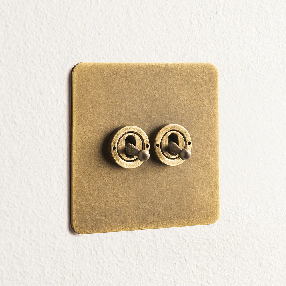 Pooky Lucian Two Gang Intermediate Toggle Switch in Aged Brass