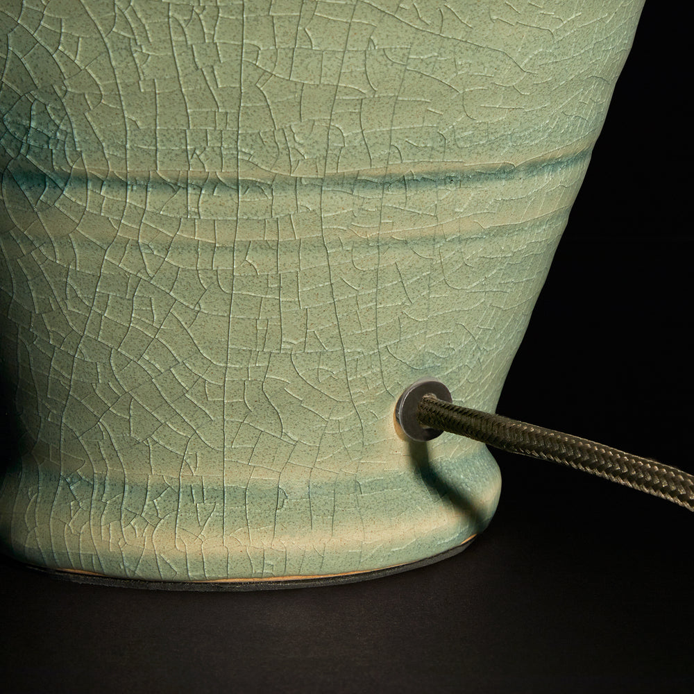 Crackled glaze detail on the Pooky - Ampulla Table Lamp Base - Dark Celadon with olive green flex.