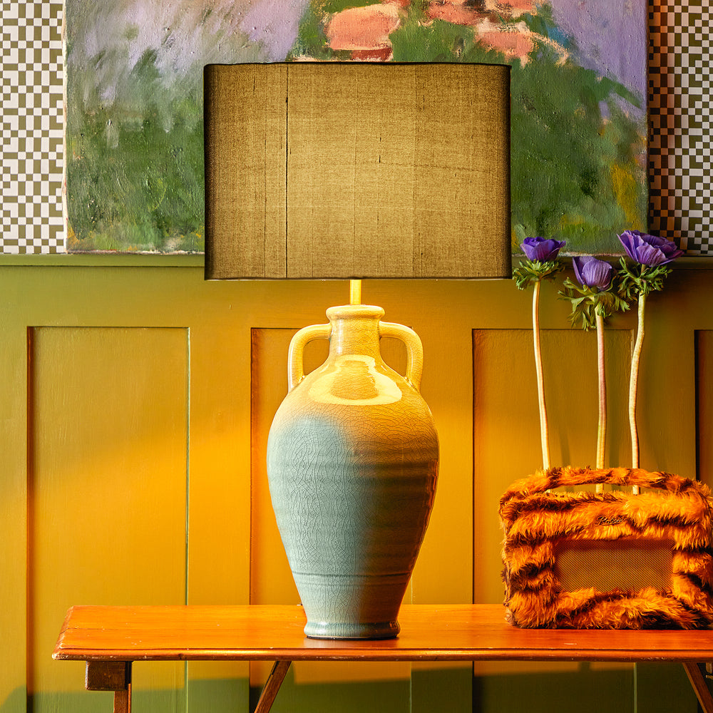 Pooky - Ampulla Table Lamp Base - Dark Celadon featuring a crackled glaze, styled on a wooden desk.