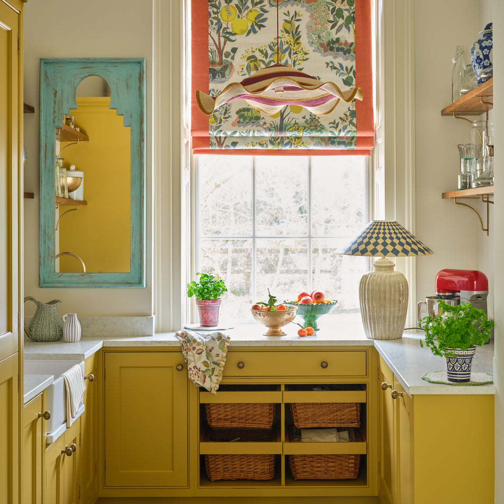 Pooky - Larger Marcie Table Lamp Base - Natural Whitewash with a blue checkered shade in a vibrant kitchen.