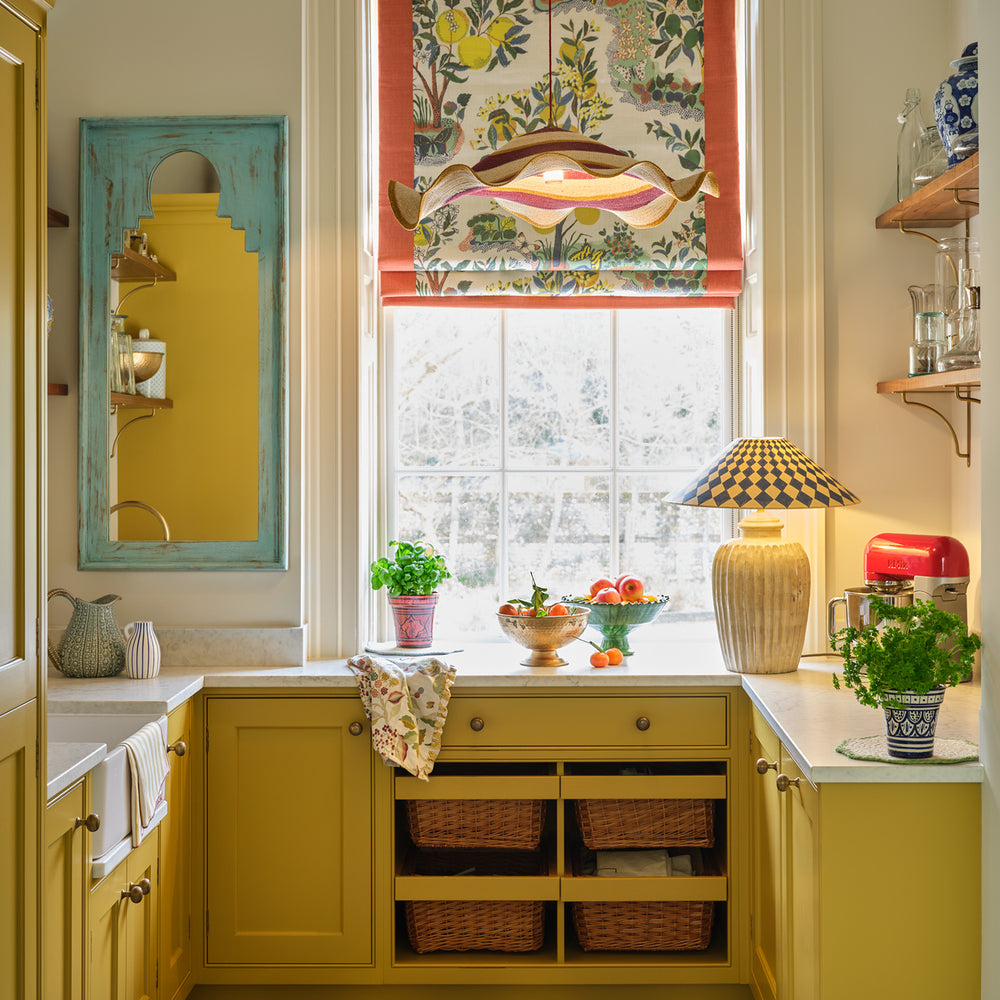 Pooky - Larger Marcie Table Lamp Base - Natural Whitewash on a yellow kitchen counter with checkered shade.