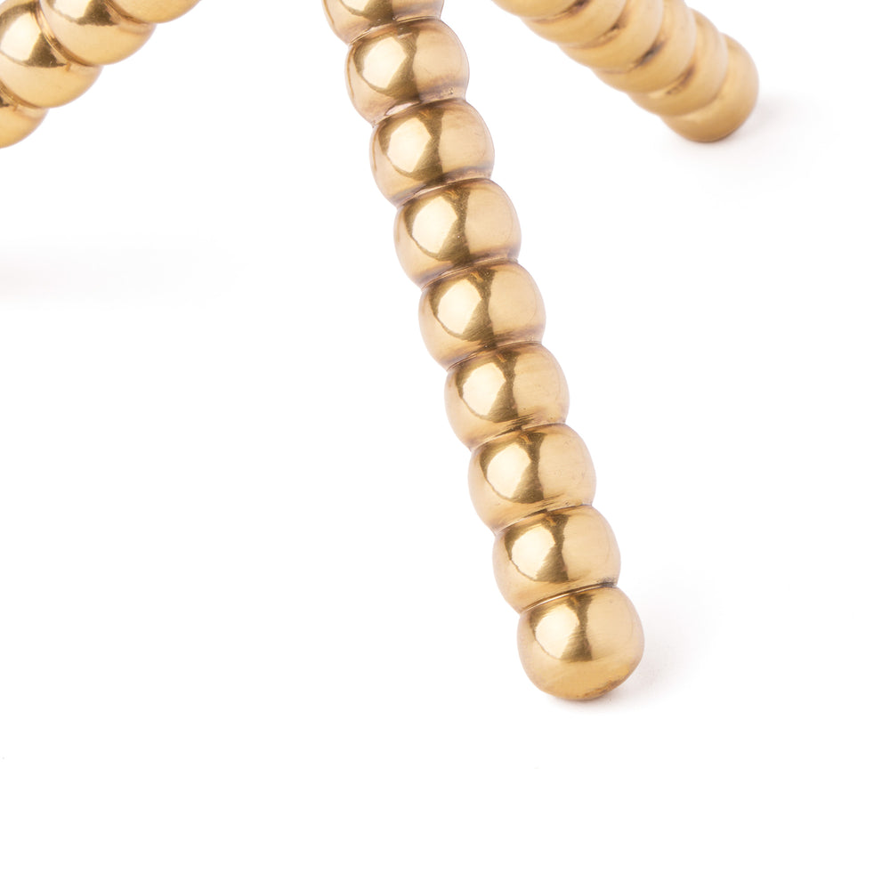 Three-pronged beaded base detail of the Pooky - Knobble Rechargeable Table Lamp Base - Brass