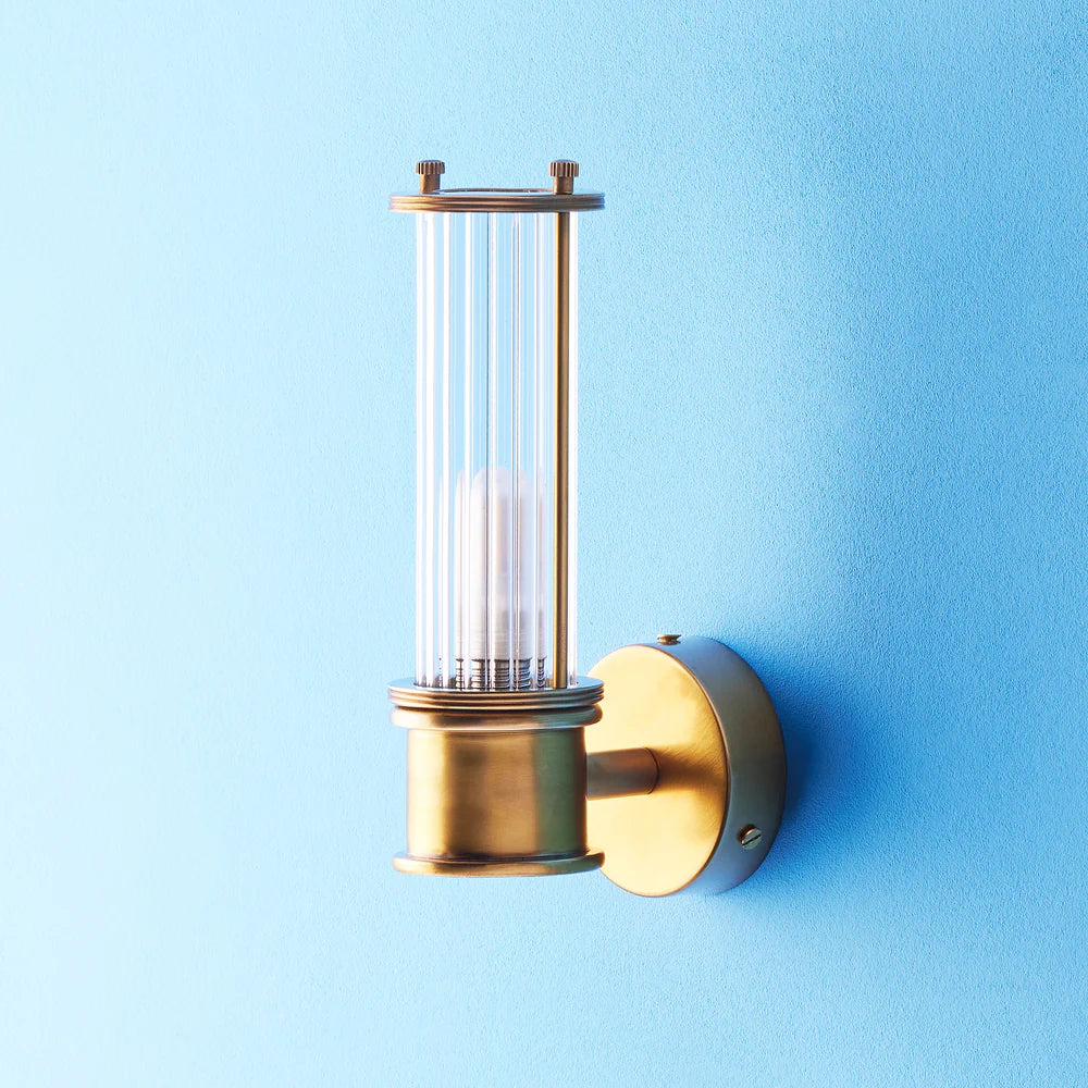 Pooky Hunter IP44 wall light in brass and glass