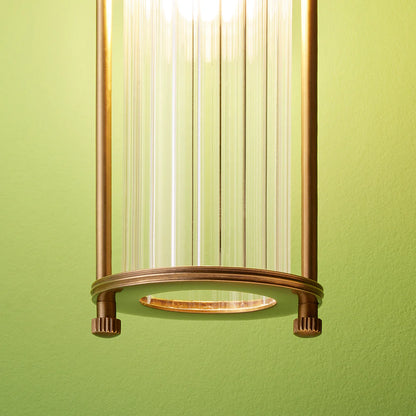 Pooky Hunter IP44 wall light in brass and glass