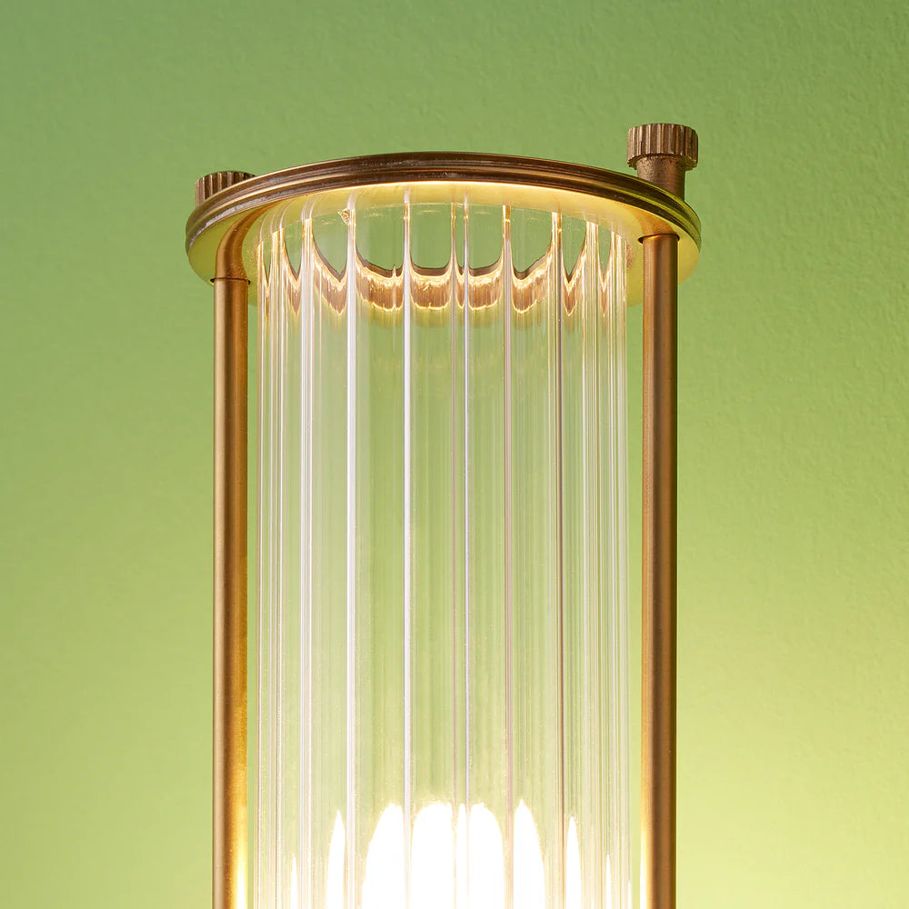 Pooky Hunter IP44 wall light in brass and glass