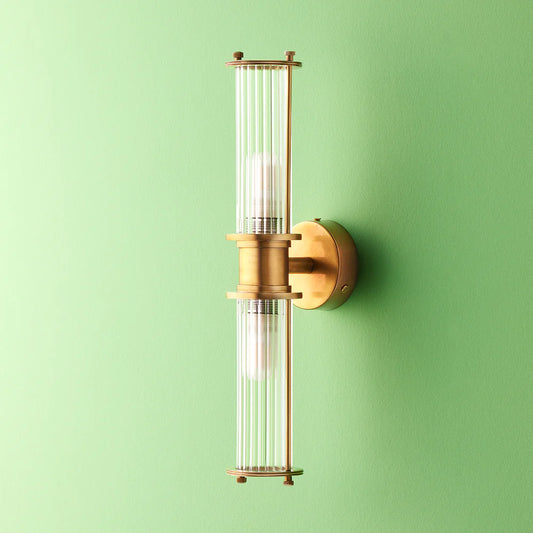 Pooky Hunter IP44 wall light in brass and glass