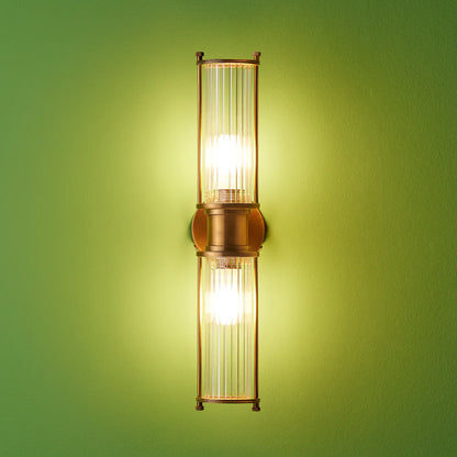 Pooky Hunter IP44 wall light in brass and glass