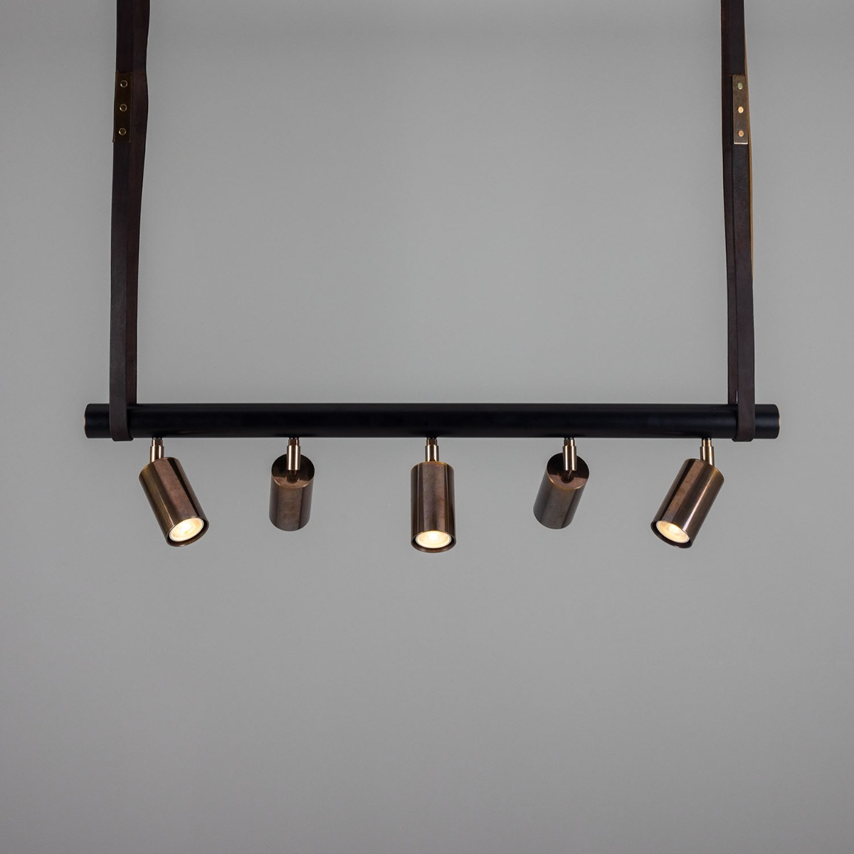 Mullan Holmes Linear Island Pendant with Leather Straps  Five-Light - Powder-Coated Matte Black and Antique Brass Finish
