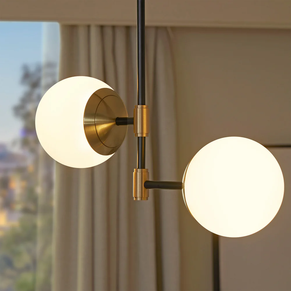Northern Light - IO Twin Arm Pendant Ceiling Lights - Brushed Brass Matt Black Finish - Matt Opal Glass Globe Ø150mm Shade