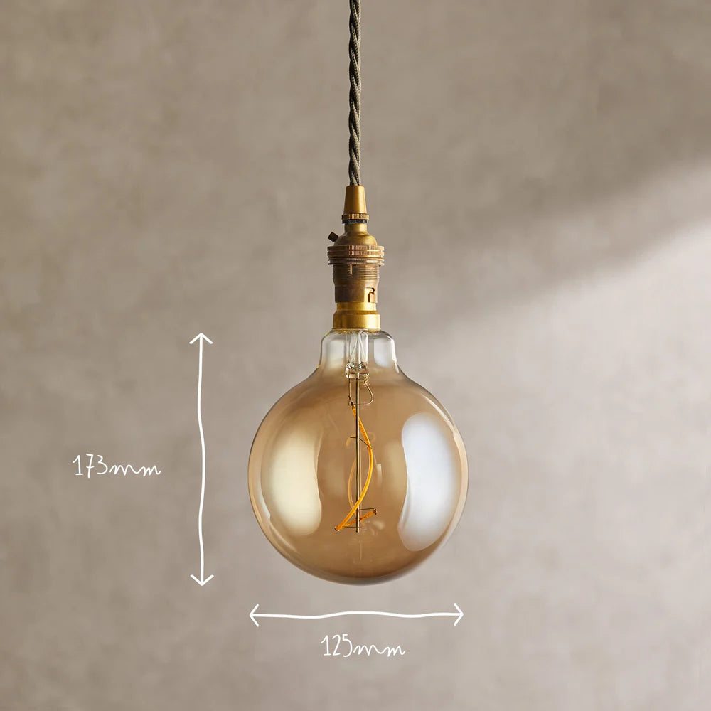 Pooky Extra Large Globe 4 Watt Irregular Filament LED Bulb with Amber Coating and B22 Fitting