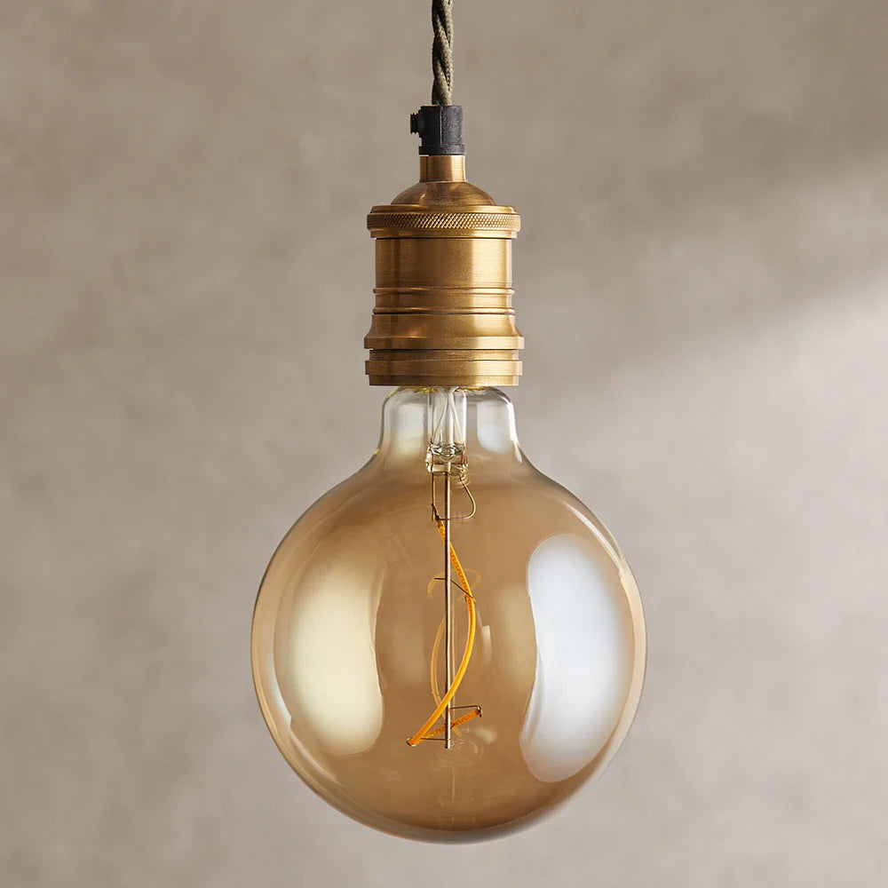 Pooky Extra Large Globe 4 Watt LED Irregular Filament Bulb with Amber Coating and E27 Fitting