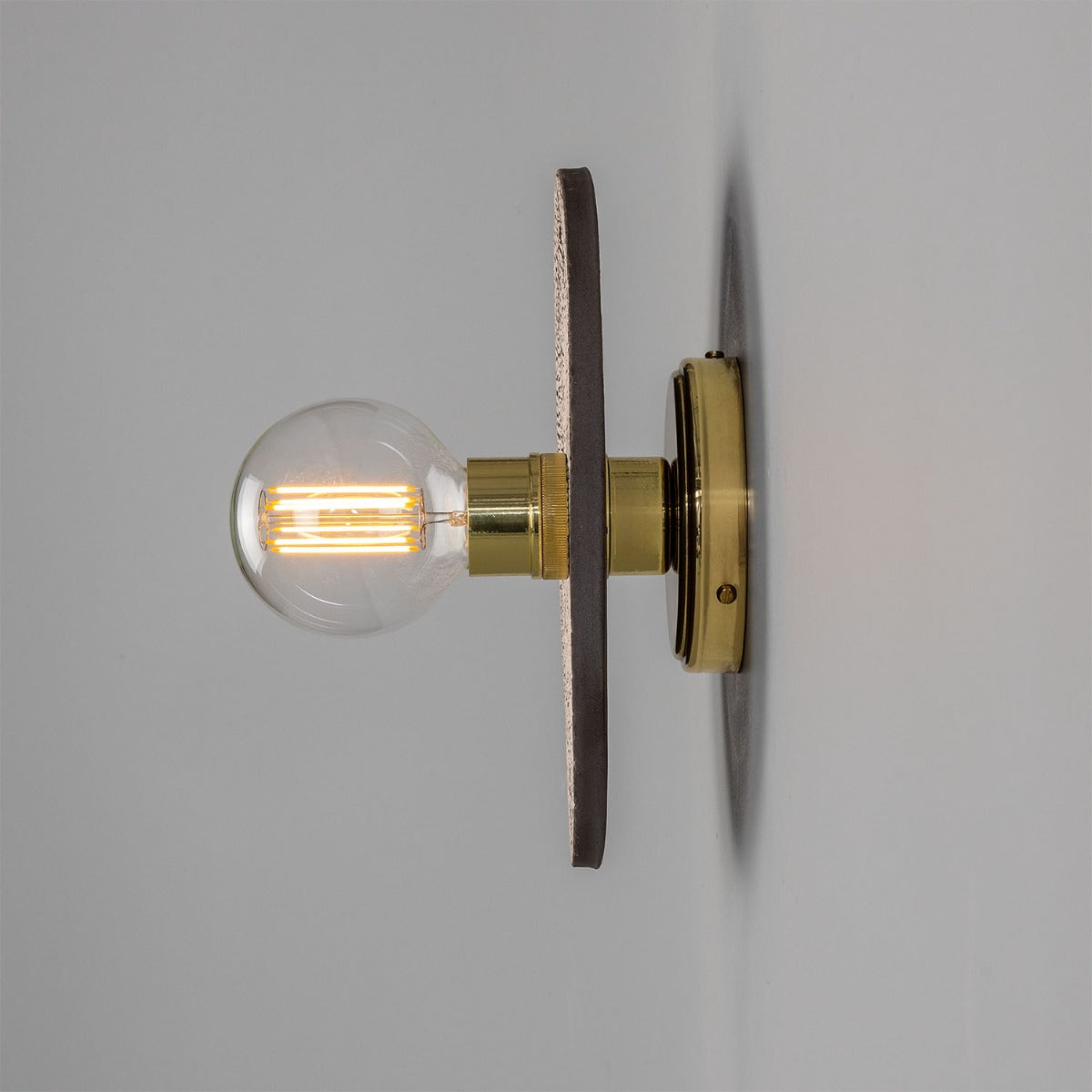 Mullan - Bog Oak Organic Ceramic Disc Wall Light Black Clay - Polished Brass Finish