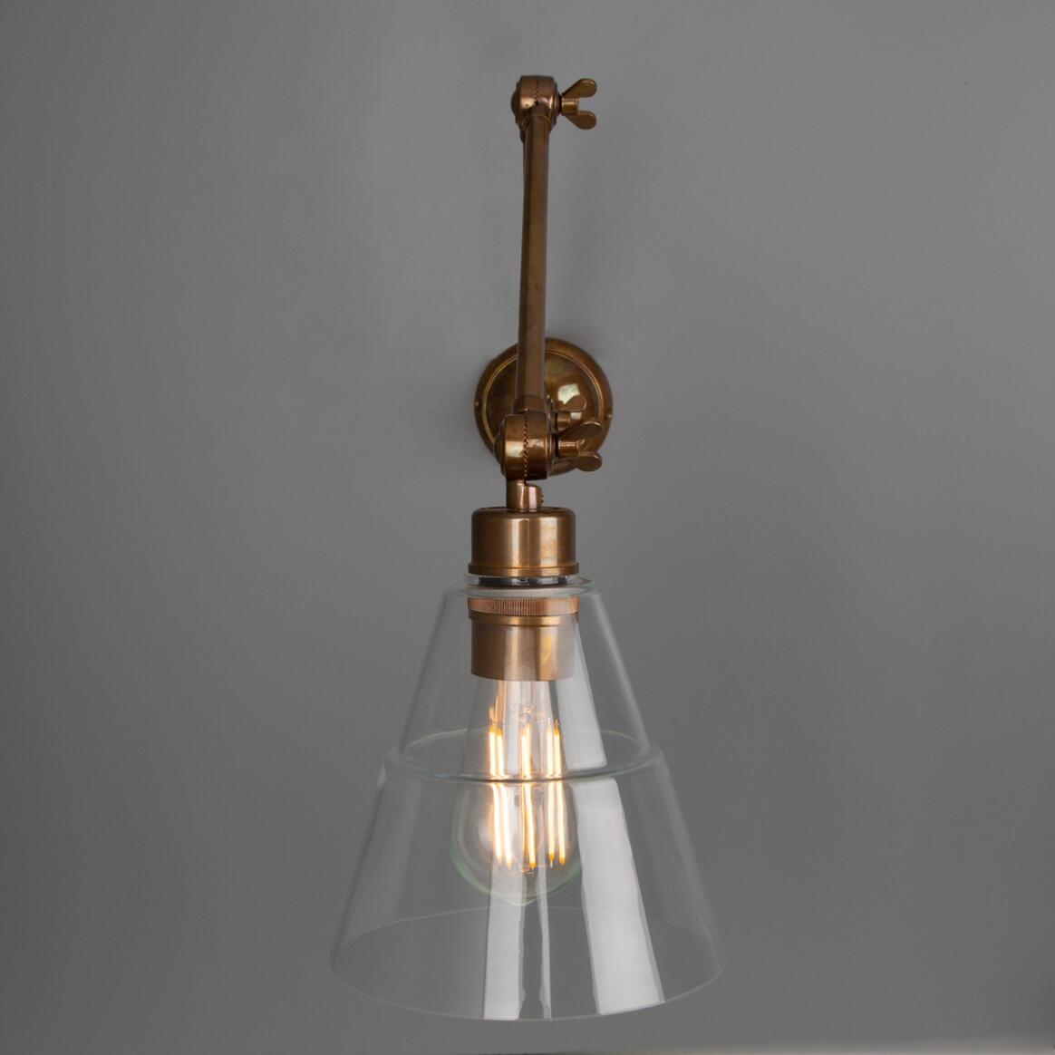 Mullan - Lyx Clear Glass Cone Adjustable Arm Wall Light - Antique Brass Finish