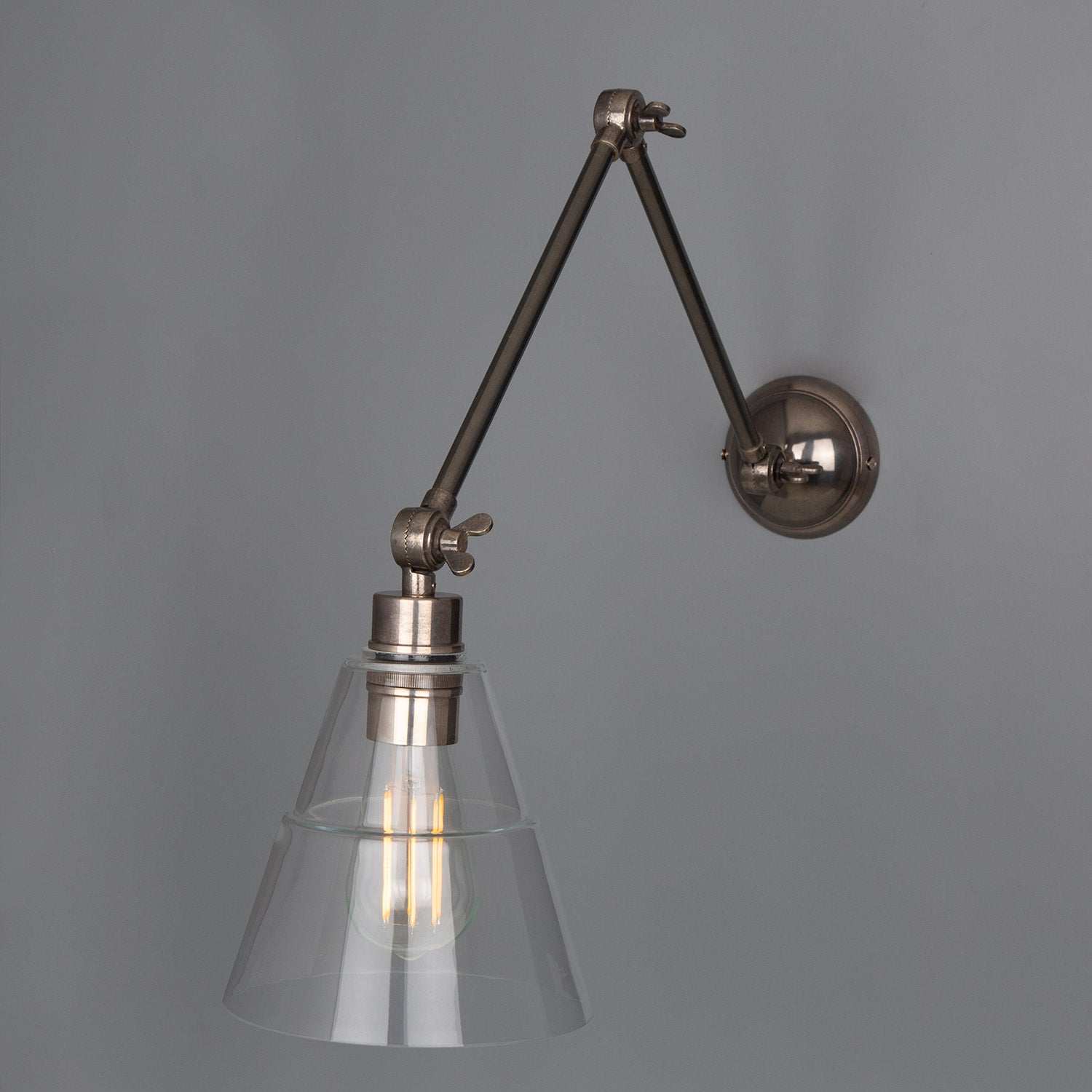 Mullan - Lyx Clear Glass Cone Adjustable Arm Wall Light - Antique Silver Finish