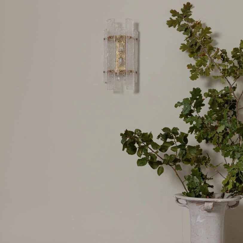 Art Deco Pure White Lines Tahli wall light with crackled glass panels.