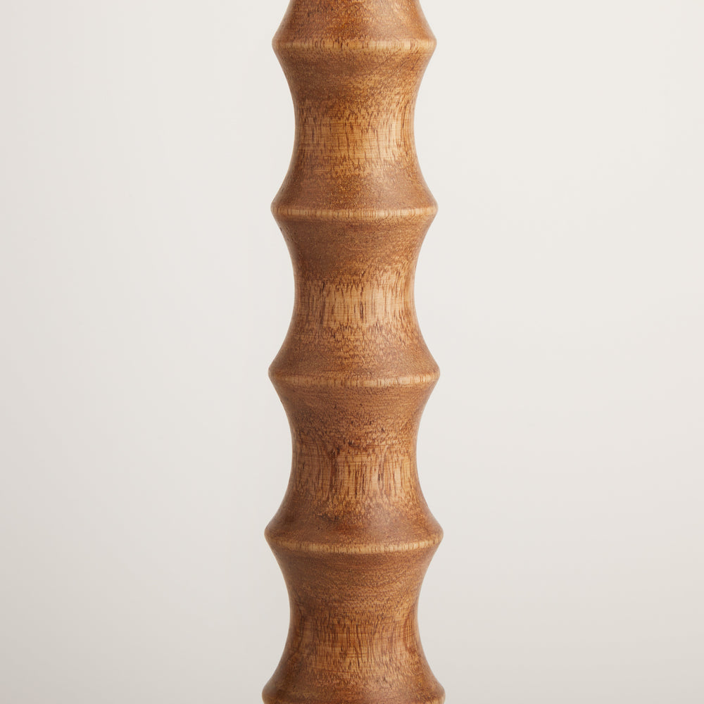 Close-up of Pooky - Tinto Table Lamp Base - Natural Wood and Antique Brass showing carved wood detail.